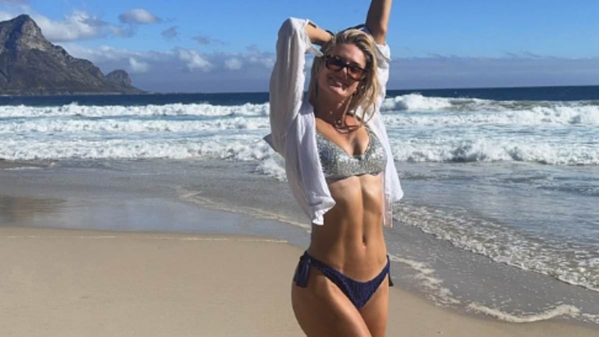 World’s ‘sexiest athlete’ Alica Schmidt leaves fans swooning as she films herself running through the sea in a bikini in Baywatch-inspired video
