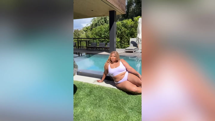 Lizzo swaps weights for wine bottle in satirical weight-loss video | Culture