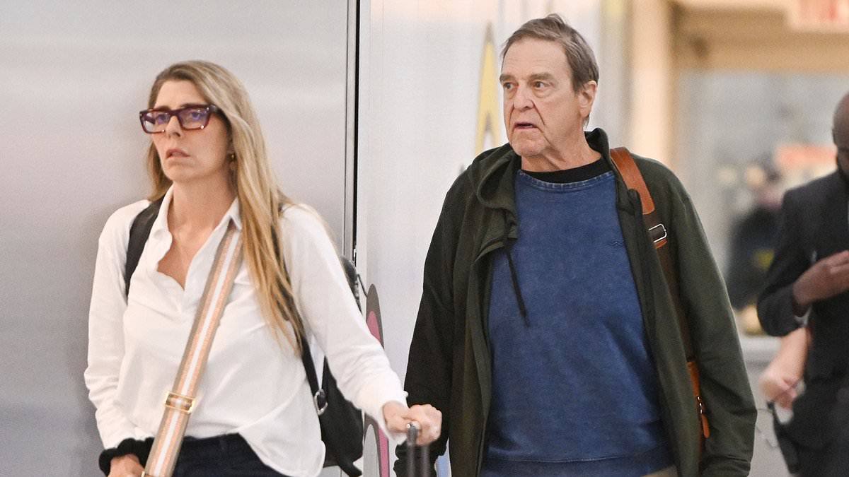 John Goodman, 71, shows off his slimmed-down figure with wife of 35 years Anna Beth in New York… after the Roseanne actor lost 200lbs [Video]