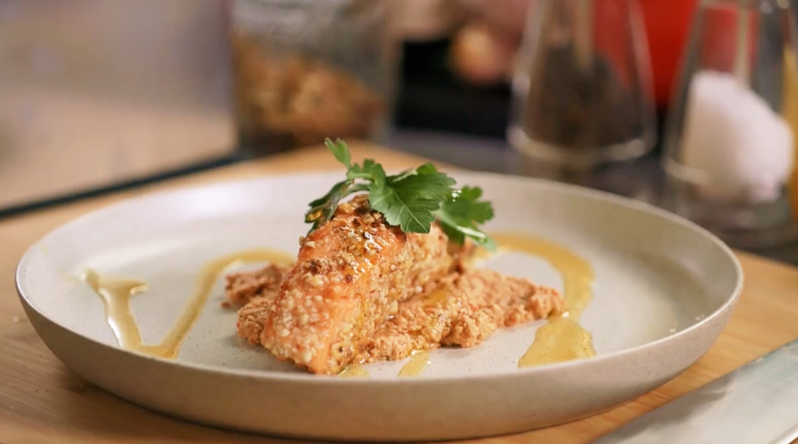 Baked nut-crusted salmon with capsicum puree [Video]